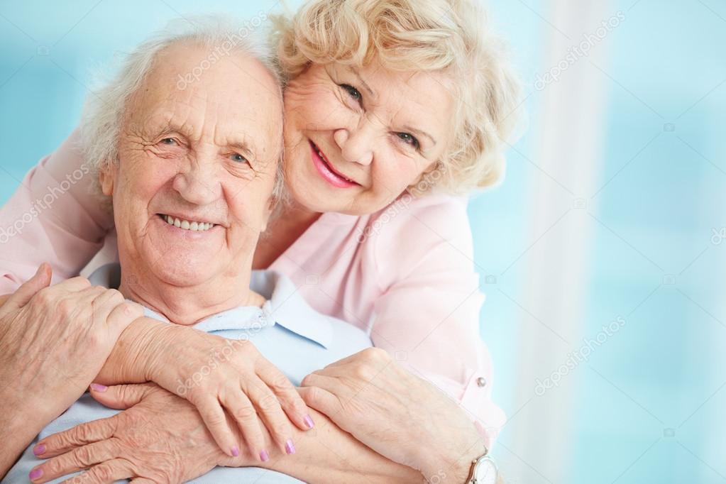 Happy and affectionate elderly couple