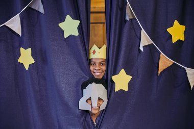 Children in costumes acting in performance clipart