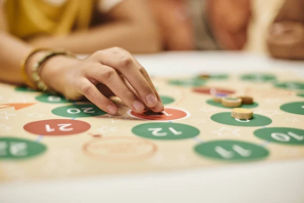 Woman playing board game — Stock Photo, Image