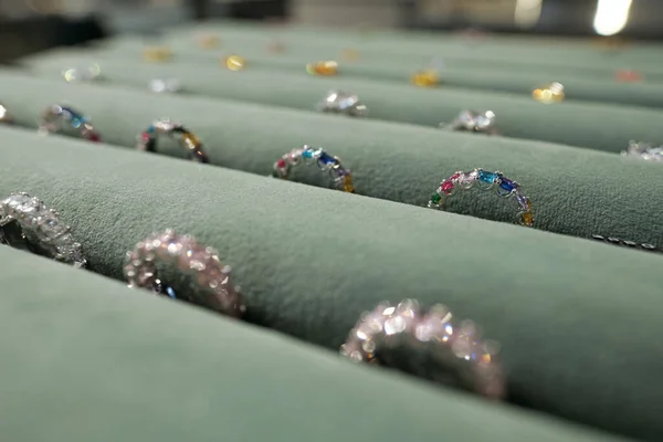 Several rows of beautiful rings with gemstones — Stock Photo, Image