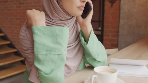 Tilting Hazel Eyed Caucasian Woman Wearing Hijab Having Coffee Cup — Stockvideo