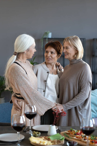 Old friends at dinner party