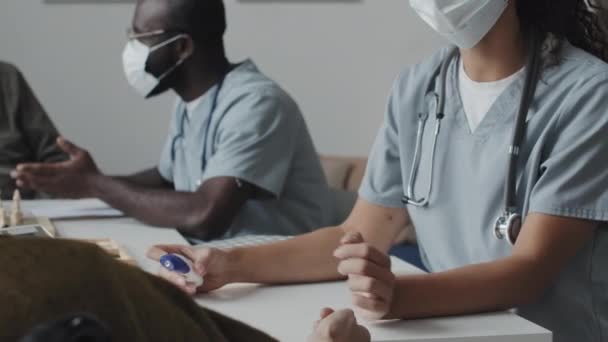 Cropped Shot Female Nurse Measuring Temperature Senior Patient Nursing Home — Stock Video