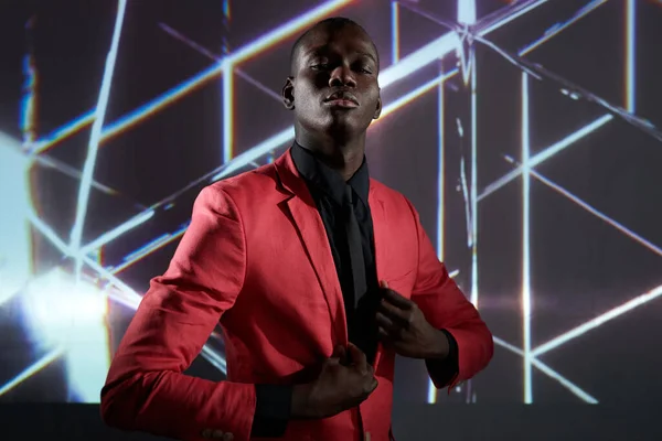 African man posing in pink jacket — Stock Photo, Image