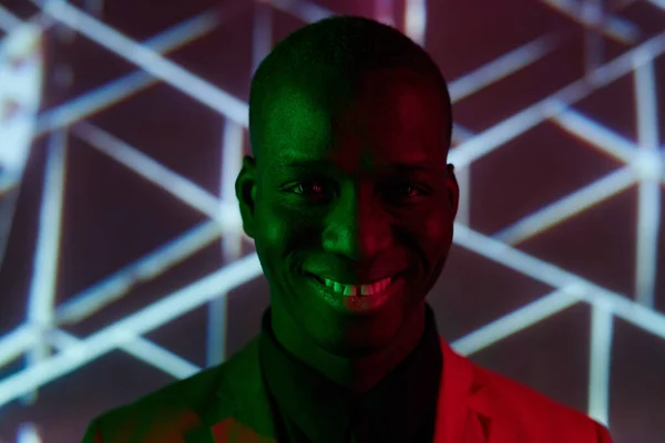 Happy young African man with toothy smile looking at camera — Stock Photo, Image