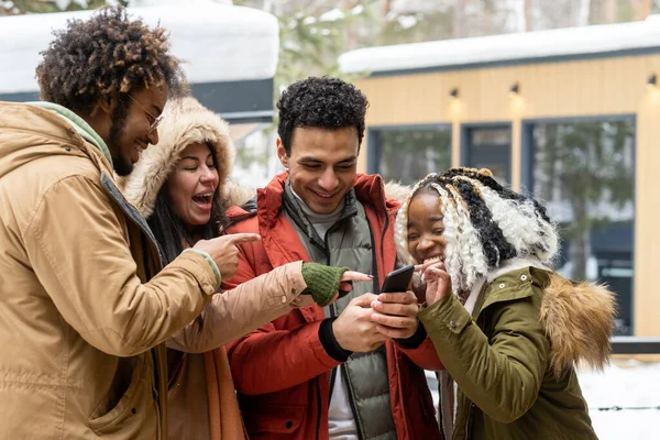 Friends watching funny video on the phone — Stock Photo, Image