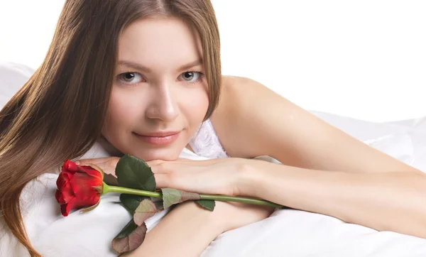 Young woman with rose in a beg — Stock Photo, Image