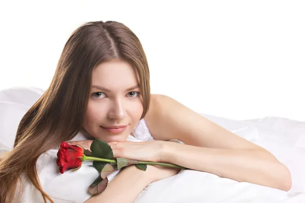Young woman with rose in a beg — Stock Photo, Image