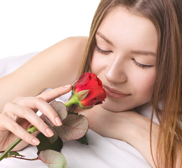 Jonge vrouw met roos — Stockfoto