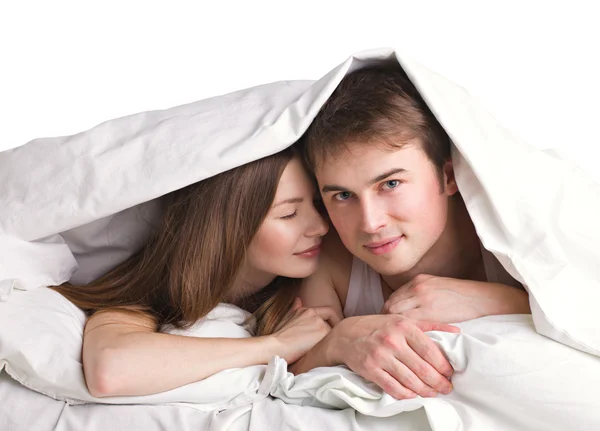 Casal em uma cama — Fotografia de Stock