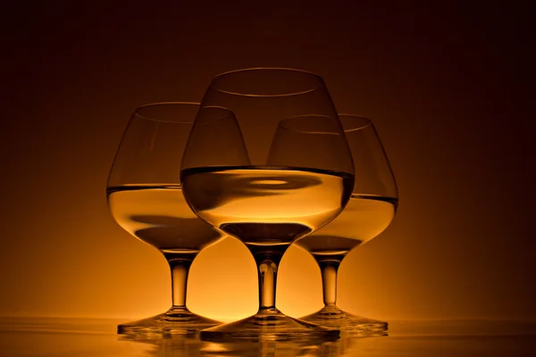 Glass for brandy with beverage — Stock Photo, Image