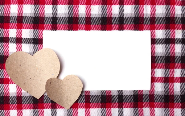 Cuadro de cuadros, papel y corazones — Foto de Stock