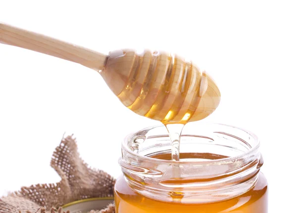 Primo piano di miele e drizzler — Foto Stock
