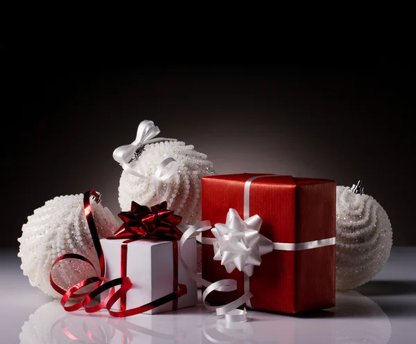 Gift boxes and christmas balls — Stock Photo, Image