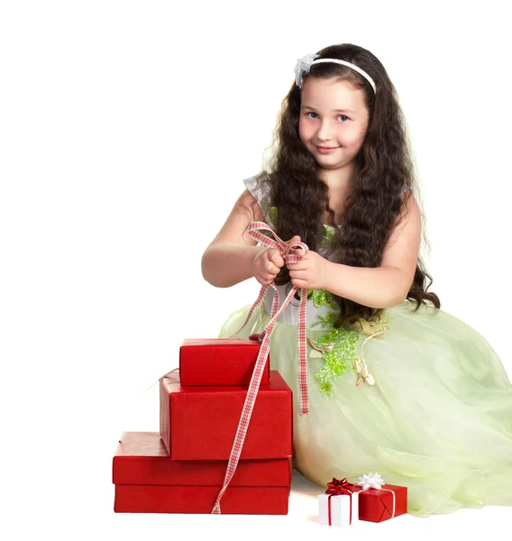 Little girl with presents — Stock Photo, Image