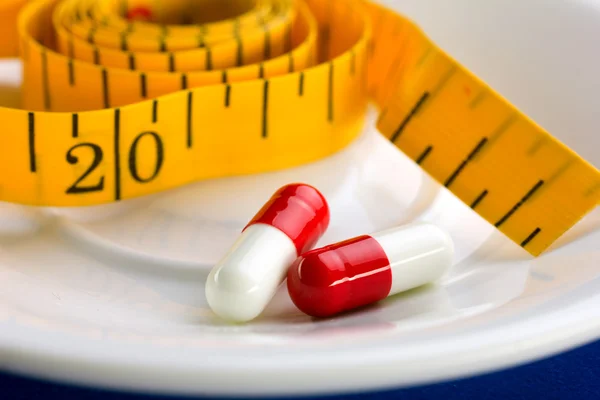 Pill and meal — Stock Photo, Image