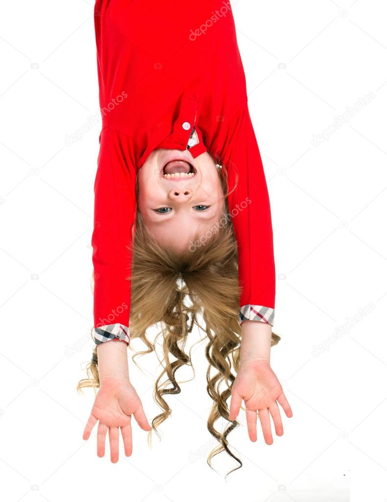 girl  hanging upside down 