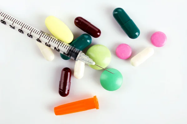 Medicaments in tablets  and capsules and insulin syringe — Stock Photo, Image