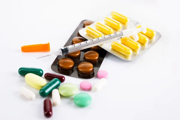 Drugs and insulin syringe — Stock Photo, Image