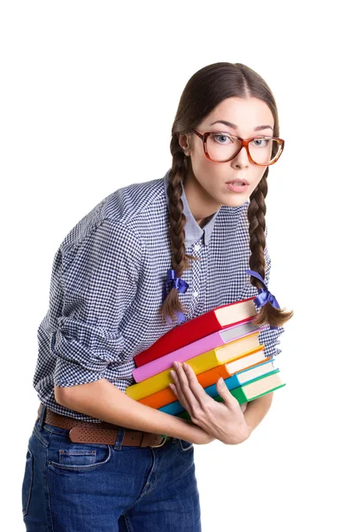 Tiener meisje met stok van boeken — Stockfoto