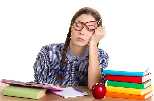 Mädchen schlafen am Tisch — Stockfoto