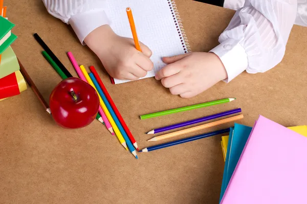 Little girl writing,  top view — Stock Photo, Image