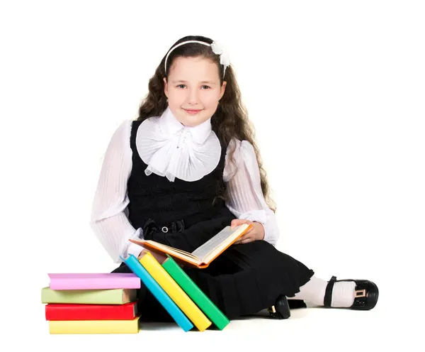 Girl with many books — Stock Photo, Image