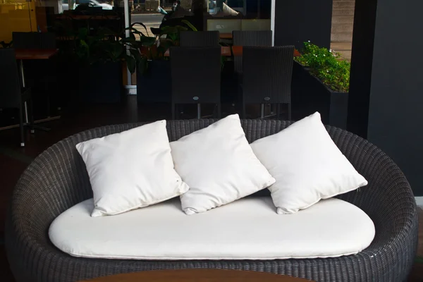 Black sofa white pillows. — Stock Photo, Image