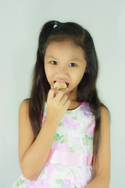 Criança comendo doce — Fotografia de Stock