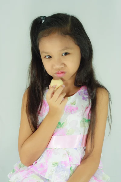 Child eating sweet — Stock Photo, Image