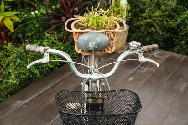 Bicycle basket of flowers — Stock Photo, Image