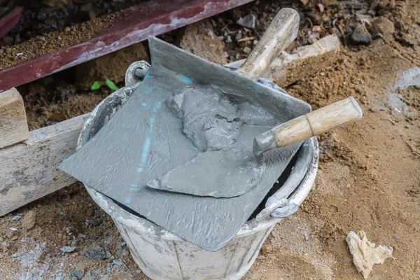 Trowel and cement — Stock Photo, Image