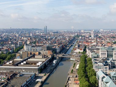 Brussels, Belgium - May 12, 2022: Urban landscape of the city of Brussels. The Senne river canal crossing Brussels.