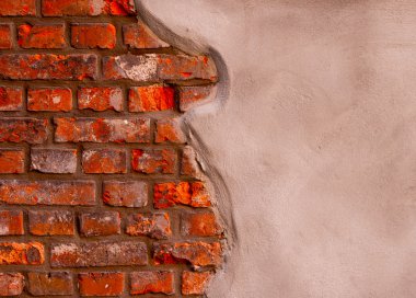 bir tuğla duvar gri sıva