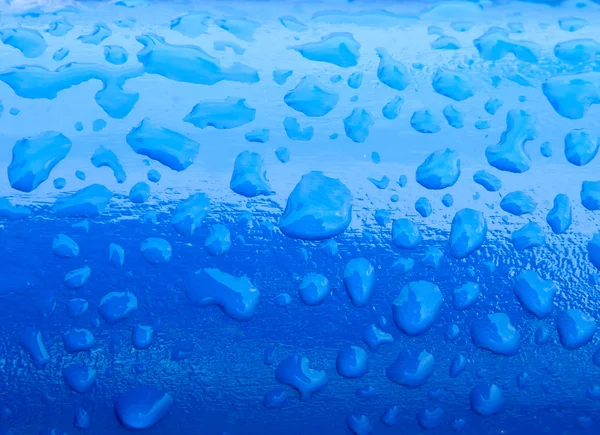 Raindrops on a painted surface — Stock Photo, Image