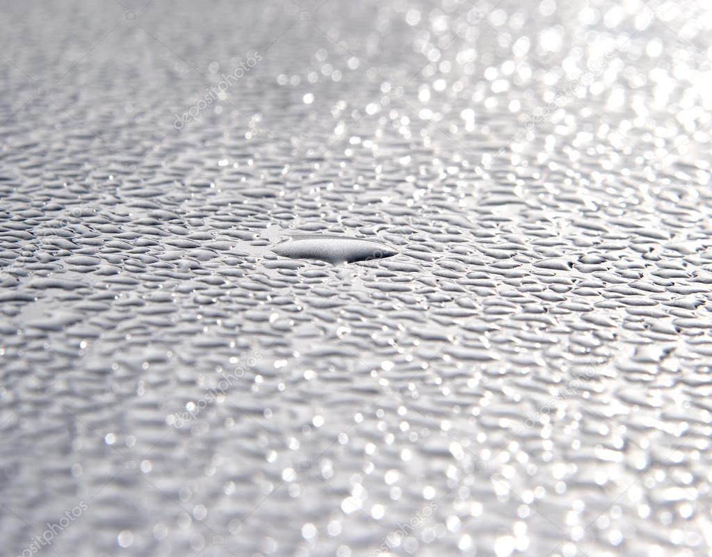 Dew drops on metal surface