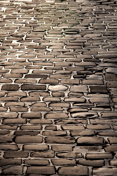 Fragment of a dark street pavement — Stock Photo, Image