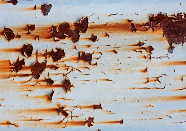 녹슨 금속 표면에 칠을 하는 모습 로열티 프리 스톡 사진