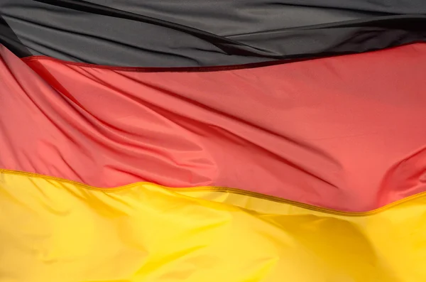 Fragment of flag of Germany in the sunlight — Stock Photo, Image