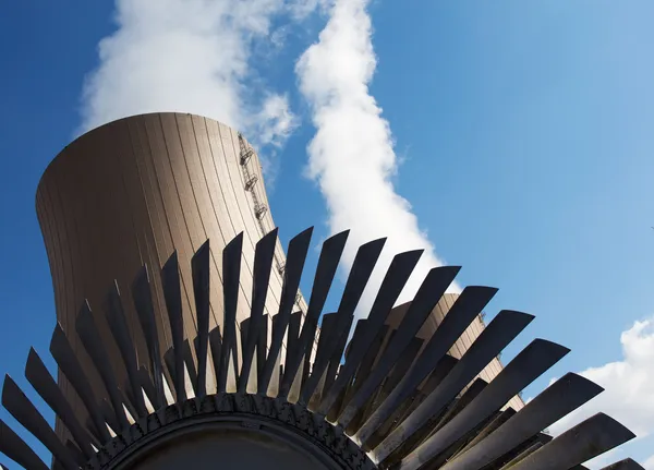 Steam turbine against nuclear power plant and sky — Stock Photo, Image