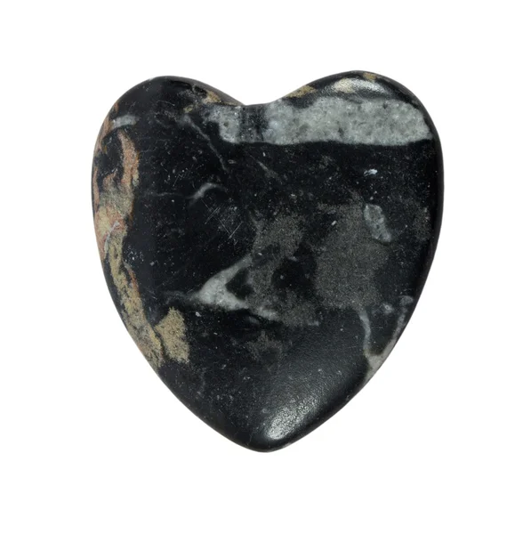 Coração de pedra de granito preto no fundo branco — Fotografia de Stock