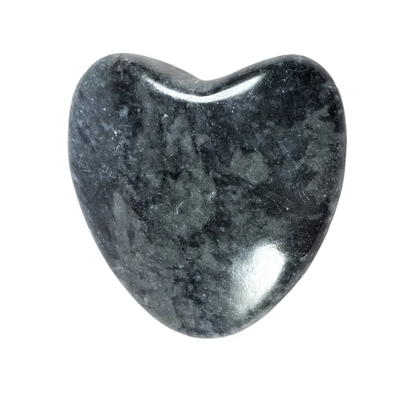 Corazón de piedra de granito gris sobre un fondo blanco — Foto de Stock