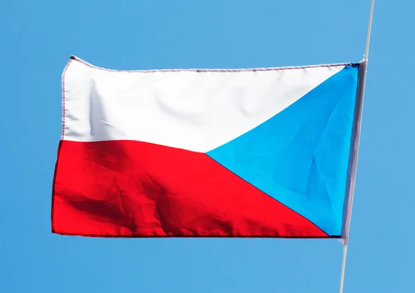 Czech flag in the wind against a sky — Zdjęcie stockowe