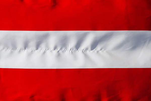 Vlag van Oostenrijk in zonlicht close-up — Stockfoto