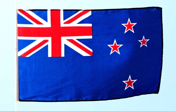 Flag of New Zealand against a sky — Stock Photo, Image