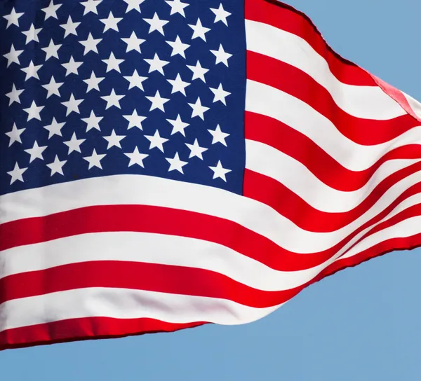Fragment of America flag against the sky — Stock Photo, Image