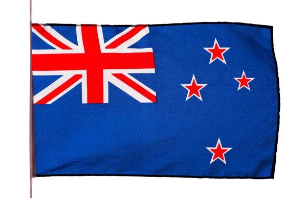 Bandiera neozelandese nel vento su sfondo bianco — Foto Stock