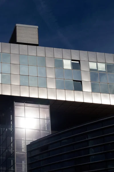 Metallic modern architecture against blue sky — Stock Photo, Image