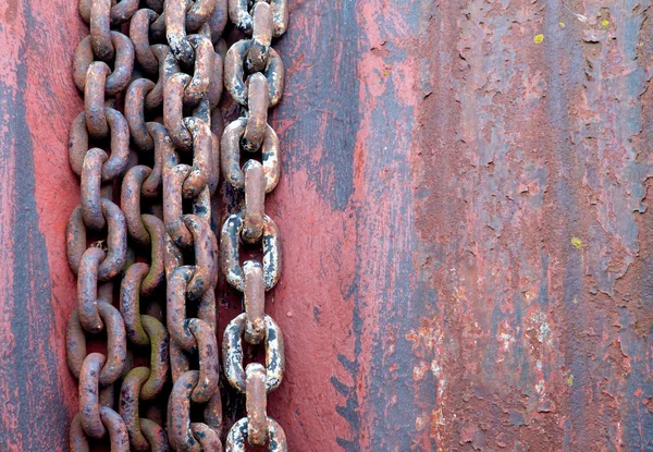 Old rusty chains on rotor — Stock Photo, Image