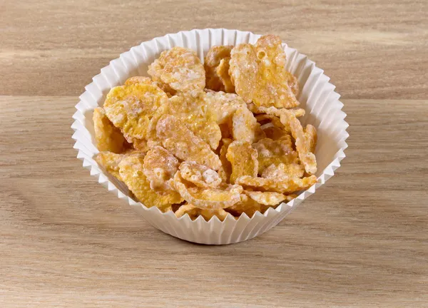 Oat flakes in paper muffin cup — Stock Photo, Image